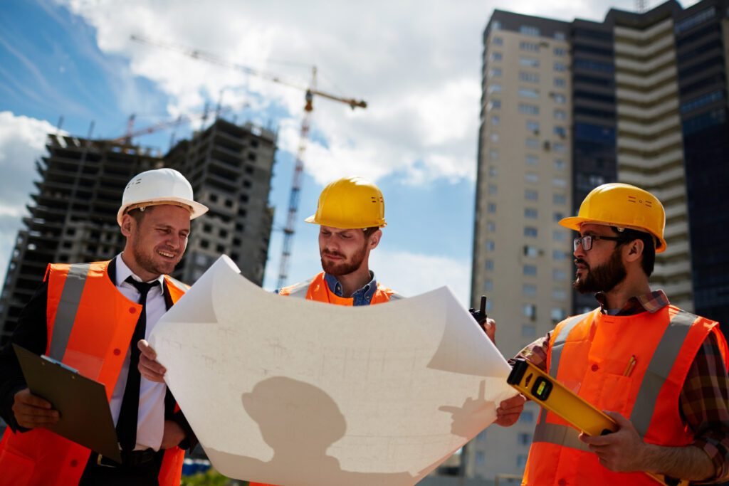 Construction Company managing residential development construction with framing, concrete, and structural progress