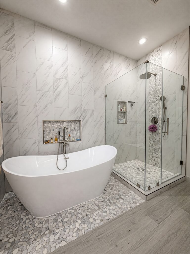 Shower Remodeling 1 Shower Remodeling featuring custom tile installation with detailed patterns and waterproof construction